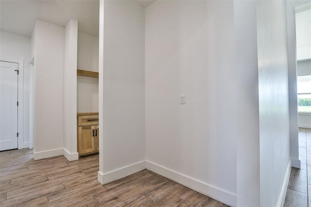 empty room with light hardwood / wood-style floors