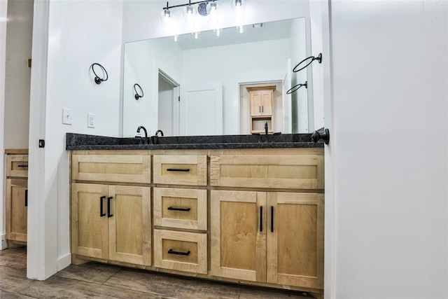 bathroom featuring vanity and hardwood / wood-style flooring