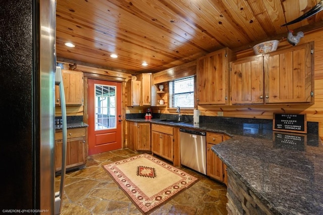 kitchen featuring stainless steel dishwasher, dark stone counters, wood ceiling, sink, and fridge