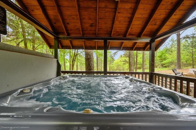 exterior space featuring a hot tub