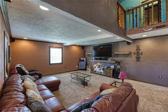 carpeted living room featuring a textured ceiling