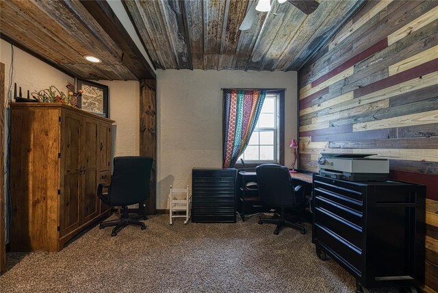 office area featuring wooden walls, carpet floors, wood ceiling, and ceiling fan