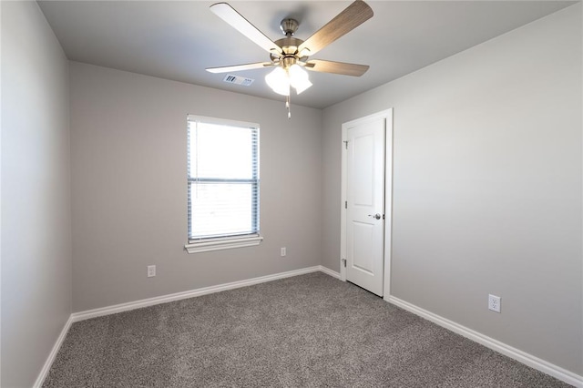 unfurnished room featuring carpet flooring and ceiling fan