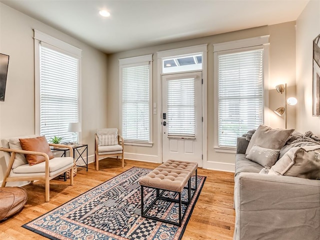 living room with light hardwood / wood-style floors