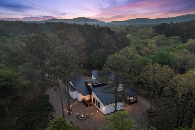 aerial view at dusk with a mountain view