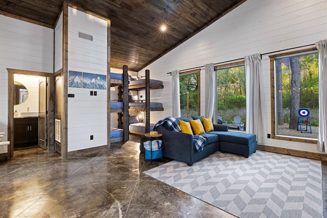 living room featuring wood walls, wooden ceiling, and high vaulted ceiling