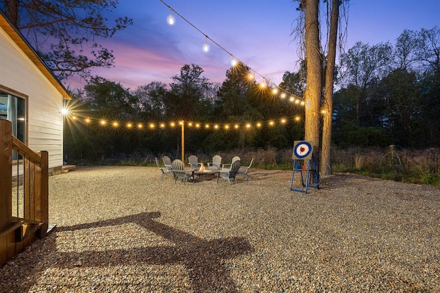 view of yard at dusk