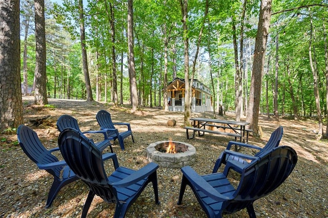 exterior space with an outdoor fire pit