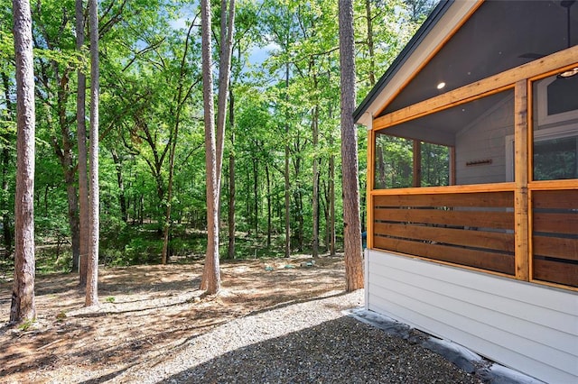 view of yard featuring a sunroom