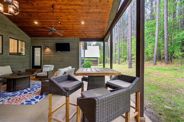 exterior space with ceiling fan and an outdoor hangout area