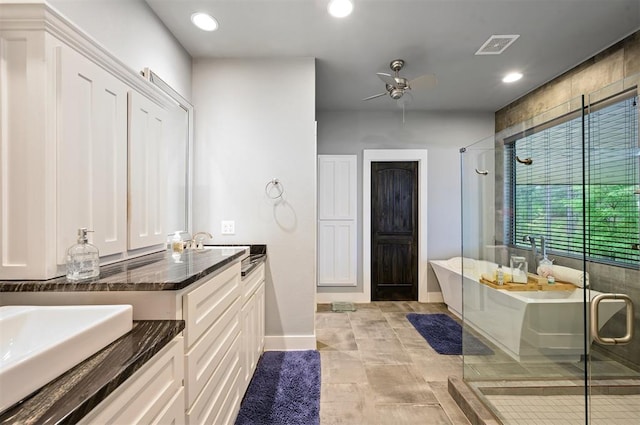 bathroom with vanity, separate shower and tub, and ceiling fan