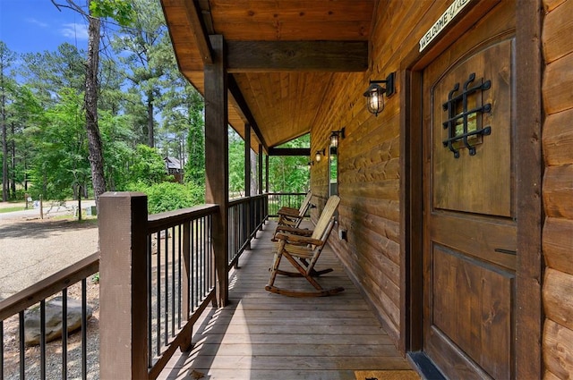 wooden deck featuring a porch