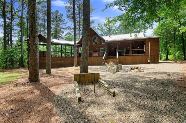 152 Ita Hina Trl, Broken Bow, OK 74728 - view of front of home featuring a deck and metal roof