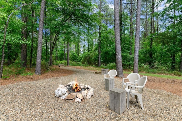 view of patio / terrace with a fire pit