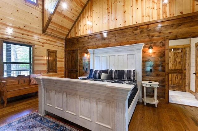 bedroom with dark hardwood / wood-style flooring, wood ceiling, wooden walls, beam ceiling, and high vaulted ceiling