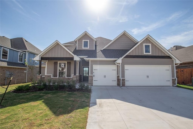 craftsman-style home with a front lawn