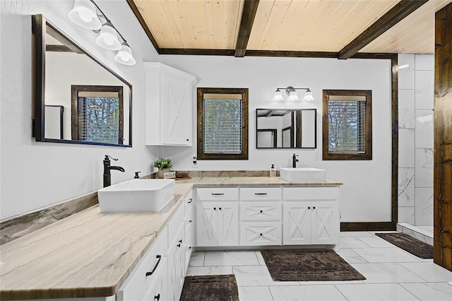 bathroom with vanity, beam ceiling, and wood ceiling