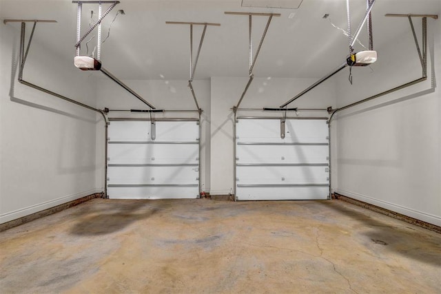 garage featuring a garage door opener