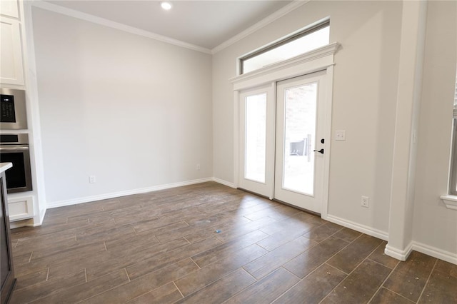 entryway featuring french doors, ornamental molding, and dark hardwood / wood-style floors