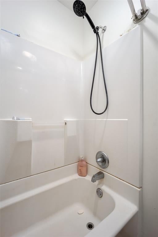 bathroom with shower / bath combination