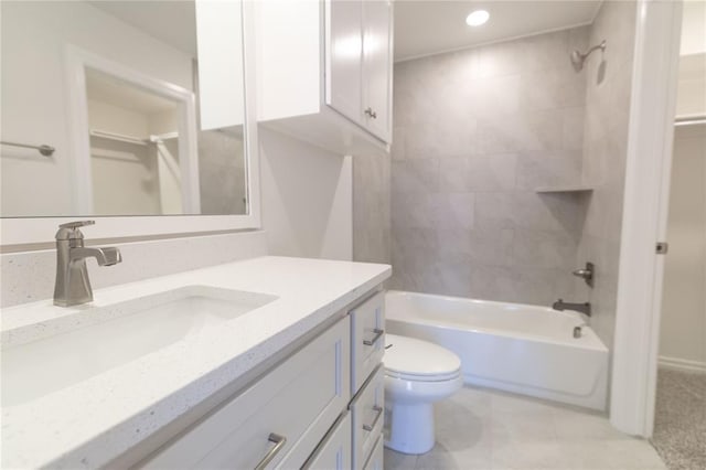 bathroom with toilet, vanity, bathing tub / shower combination, and recessed lighting