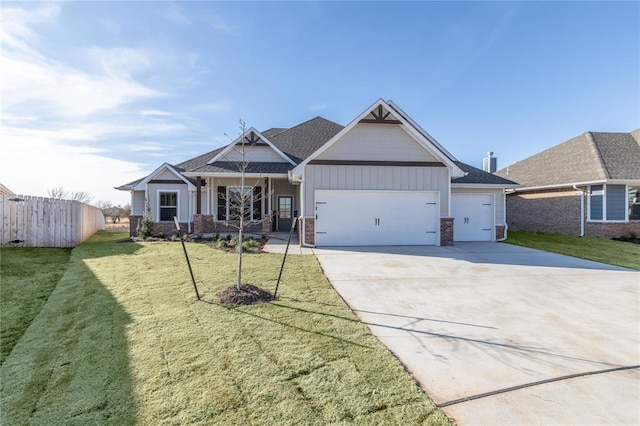 craftsman-style house with a garage and a front yard