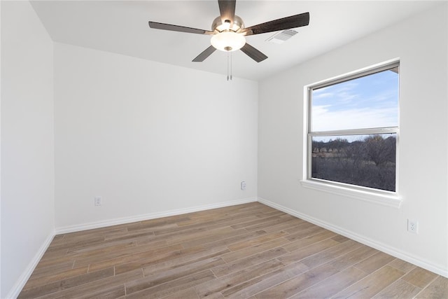 unfurnished room featuring ceiling fan