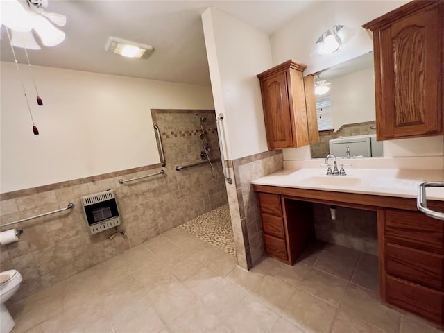 bathroom featuring tile patterned floors, tile walls, walk in shower, and heating unit