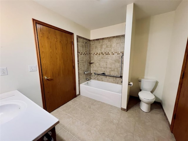 full bathroom with tile patterned flooring, vanity, toilet, and tiled shower / bath combo