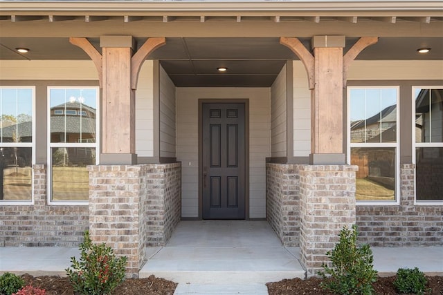 property entrance with a porch