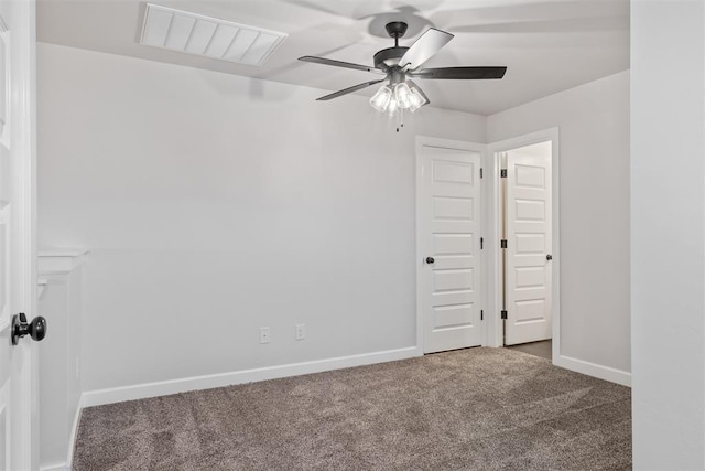 carpeted empty room with ceiling fan