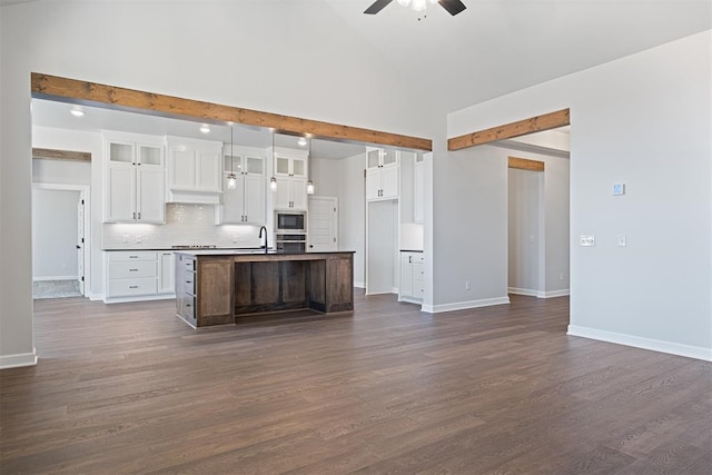 13268 Sawtooth Oak Rd, Choctaw, OK 73020 - kitchen featuring stainless steel appliances, ceiling fan, tasteful backsplash, white cabinets, and high vaulted ceiling