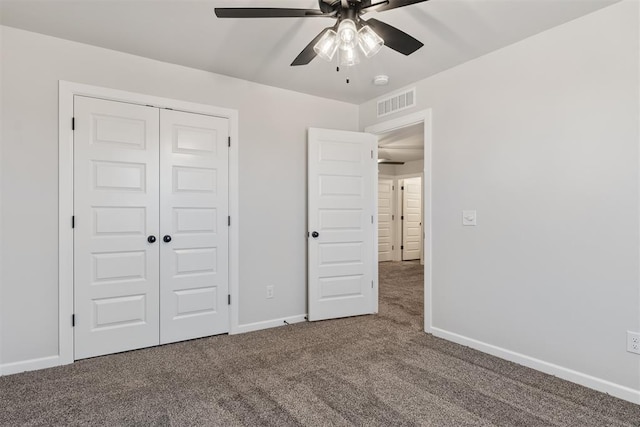 13268 Sawtooth Oak Rd, Choctaw, OK 73020 - unfurnished bedroom with carpet flooring, a closet, and a ceiling fan