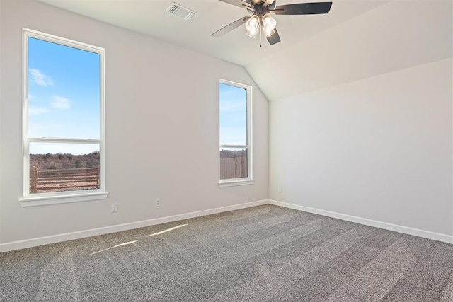 13268 Sawtooth Oak Rd, Choctaw, OK 73020 - empty room with ceiling fan, vaulted ceiling, and carpet