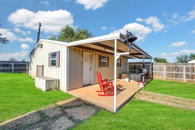 view of outdoor structure featuring a yard