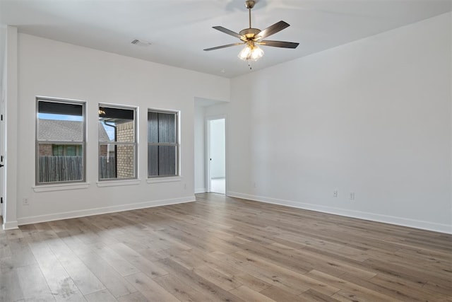 unfurnished room featuring ceiling fan and light hardwood / wood-style flooring