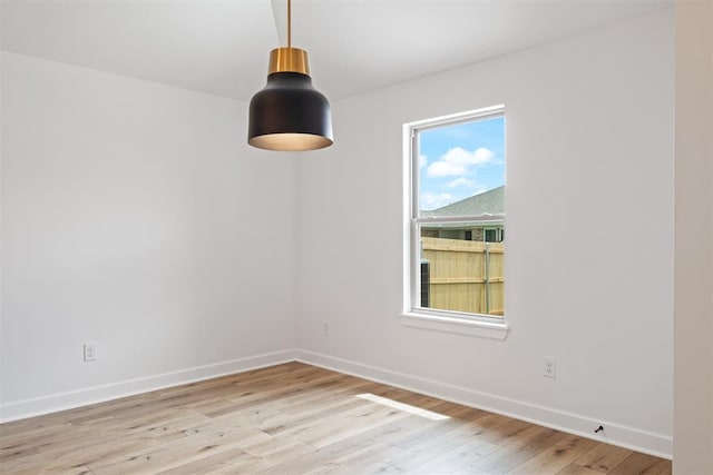 unfurnished room featuring light hardwood / wood-style flooring