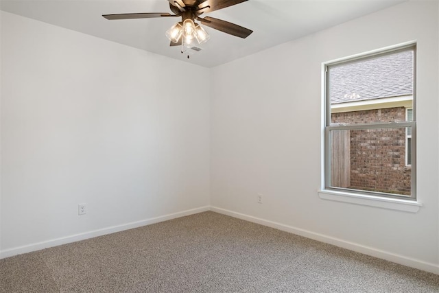 carpeted empty room with ceiling fan