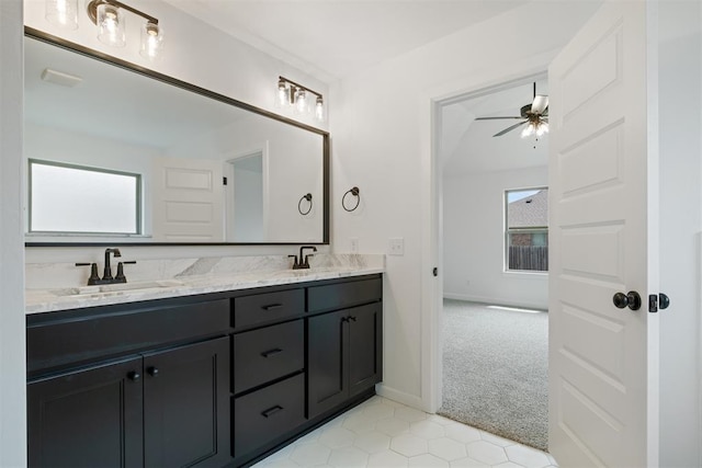 bathroom with tile patterned flooring, vanity, plenty of natural light, and ceiling fan