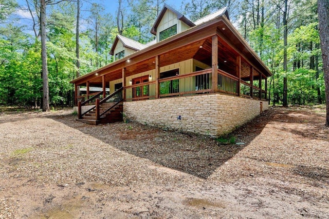 view of home's exterior featuring covered porch