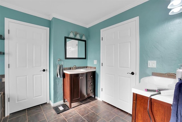 bathroom featuring tile patterned flooring, vanity, and ornamental molding