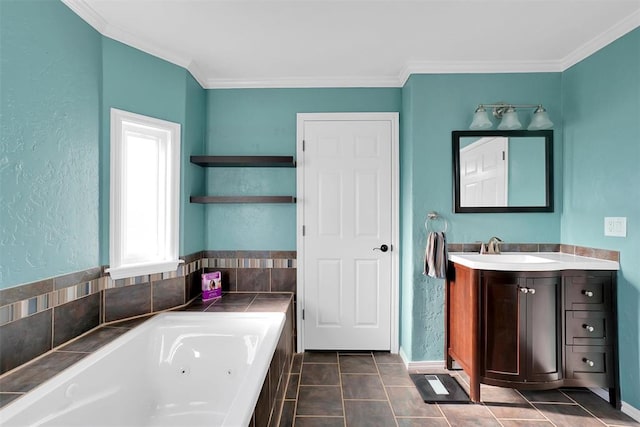 bathroom with tile patterned flooring, vanity, a bath, and ornamental molding