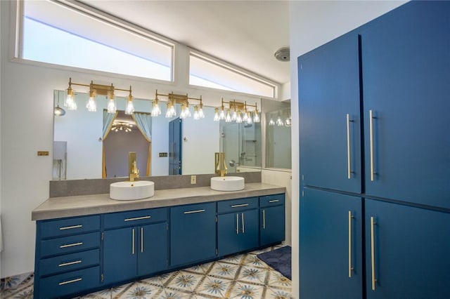 bathroom with vanity and vaulted ceiling