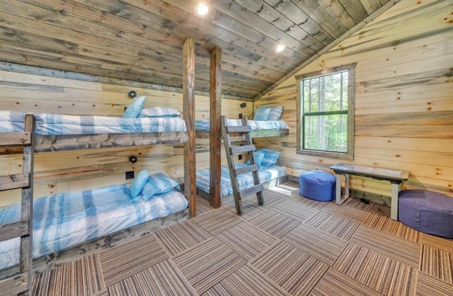 unfurnished bedroom with wooden walls, wooden ceiling, and lofted ceiling