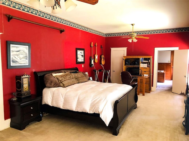 bedroom with light carpet and ceiling fan