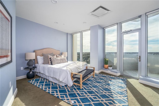 bedroom featuring access to outside and carpet floors