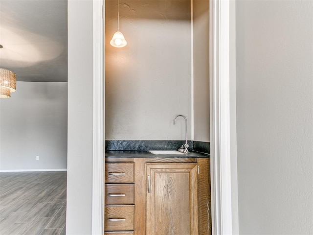 bathroom with vanity and hardwood / wood-style flooring