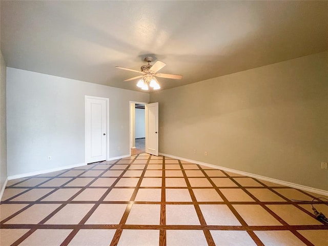 unfurnished room featuring ceiling fan