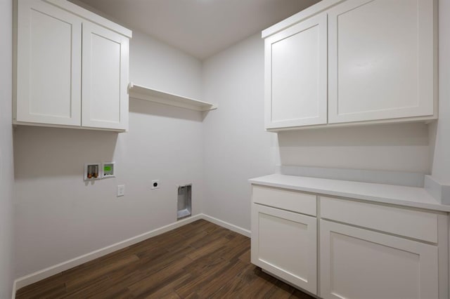 laundry area featuring washer hookup, cabinets, dark wood-type flooring, and hookup for an electric dryer