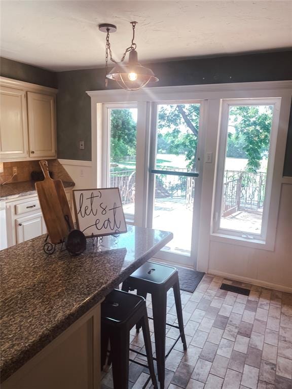 dining room with a healthy amount of sunlight